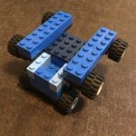 The fire person sits in it and it has wheels on the guns on the bottom so it can drive on the edges of cliffs. It has wheels on the bottom of the main body to drive on the road. Diamond Armor