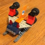 This vehicle moves really fast and is used in army war. The four clear dots in the front are the laser blasters and the blue square in the front is where the person sits. Laser Blaster One Billion