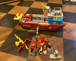 This is an erupting volcano that a guy is stranded on with all his awesome gold! There is an invisible bridge with a cannon on it that is to save him. The cannon is to knock any bad guys off it. There is also a guy with a jetpack on the boat that if the guy stranded needs any help the jetpack guy will fly over with his supersonic jetpack and help him. This is an erupting volcano that a guy is stranded on with all his awesome gold! There is an invisible bridge with a cannon on it that is to save him. The cannon is to knock any bad guys off it. There is also a guy with a jetpack on the boat that if the guy stranded needs any help the jetpack guy will fly over with his supersonic jetpack and help him.