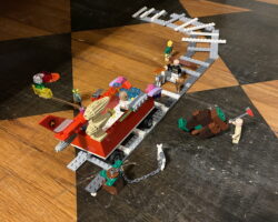 Once there was an evil guy and he made an evil automatic train and he drove on the train tracks with it. But then, good guys revealed to stop him! Once there was an evil guy and he made an evil automatic train and he drove on the train tracks with it. But then, good guys revealed to stop him!